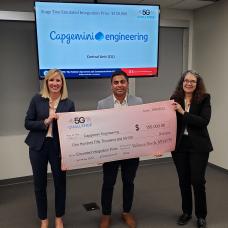 Amanda Toman, DoD OUSD(R&E) (left) and Rebecca Dorch, NTIA/ITS (right) with Stage Two Emulated Integration Prize winner Rajat Kapoor, Capgemini (middle)