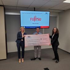 Amanda Toman, DoD OUSD(R&E) (left) and Rebecca Dorch, NTIA/ITS (right) with Stage Two Emulated Integration Prize winner Mohammad Qutishat, Fujitsu (middle)