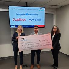 Amanda Toman, DoD OUSD(R&E) (left) and Rebecca Dorch, NTIA/ITS (right) with Stage Three Network Integration winner Rajat Kapoor, Capgemini (middle) 